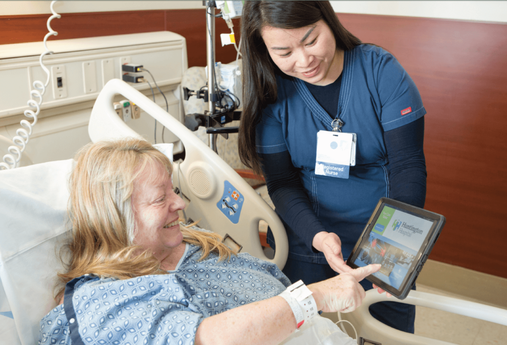 Nurse Demonstrates Post Operative Care Tablet 