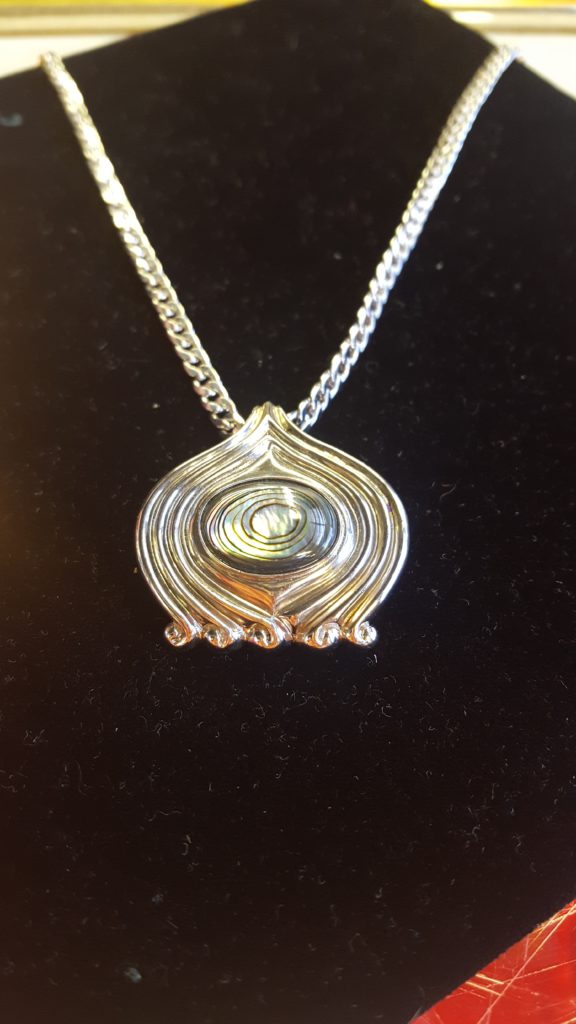 gold colored necklace