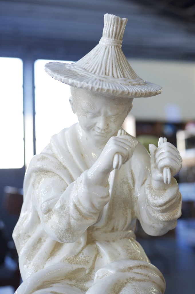 statue of person with eyes closed