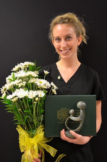 Sable Williams holding the Daisy award