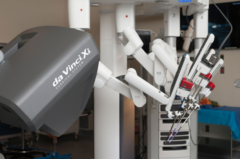 da Vinci Xi robotic surgical system with articulating arms in operating room