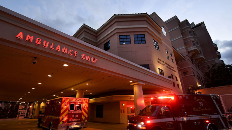 Ambulances outside Schow Emergency and Trauma Center at night.