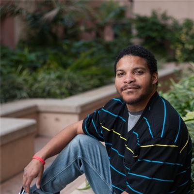 Raymond Towns, sitting outside at Huntington Hospital
