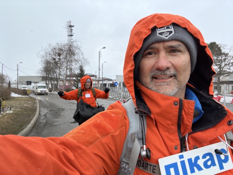 Physician Joins Rescue Team to Treat Ukraine Orphans, picture if man walking